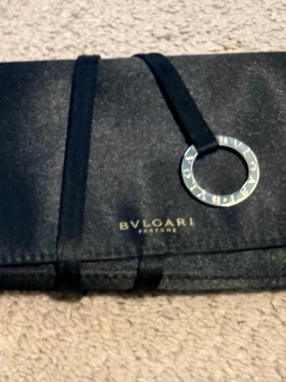 Bvlgari Black Clutch with Signature Metal Ring